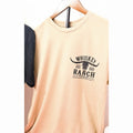 Whiskey Ranch Tools tan T-shirt, front with black left chest logo